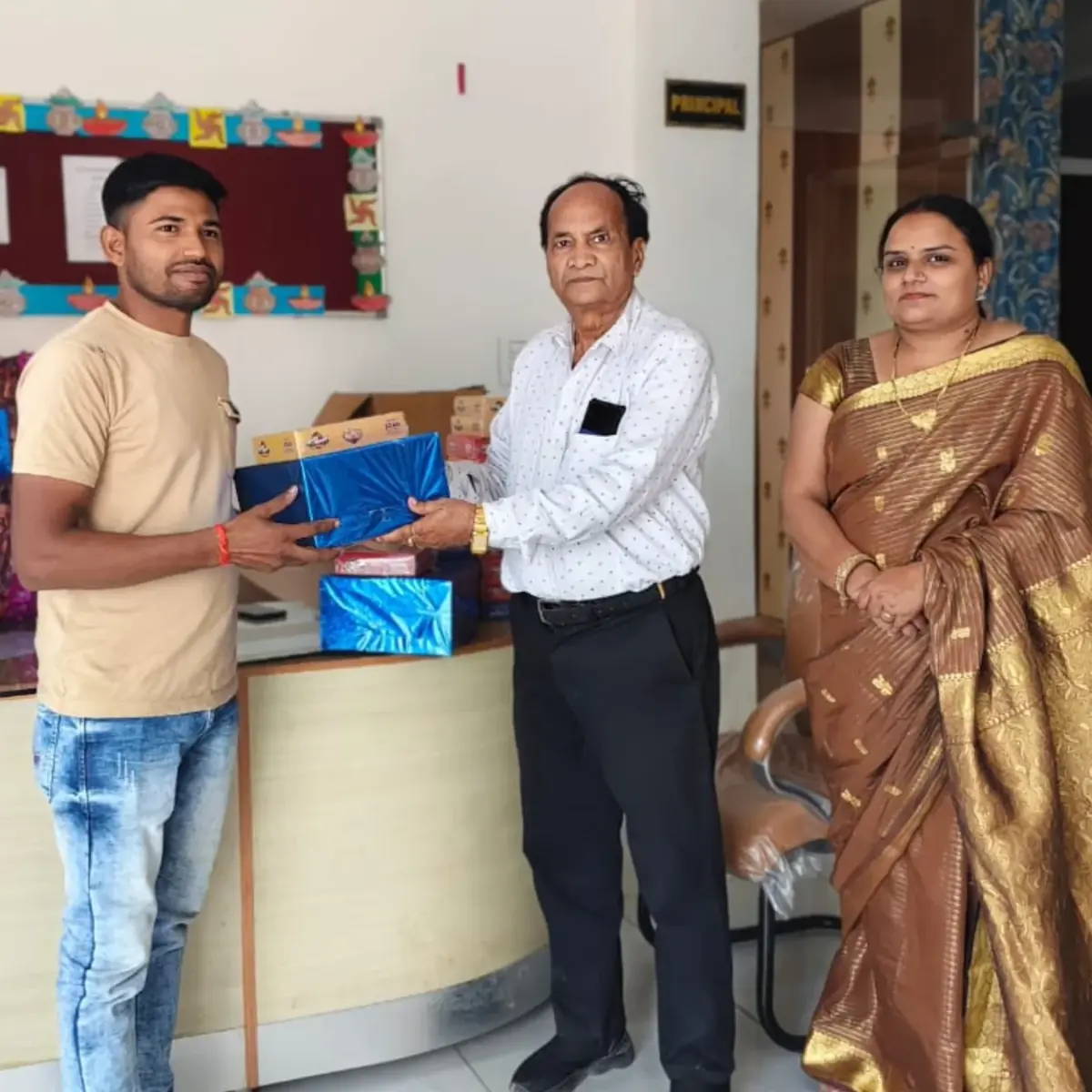 Gift presentation at A. U. International School